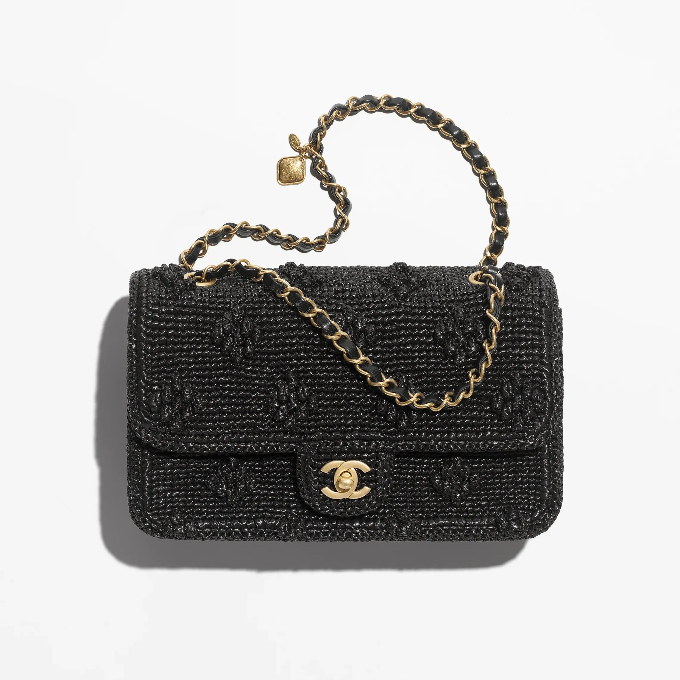 シャネル フラップ バッグ 素材:ラフィア エフェクト ウィービング 色:ブラック
キャメル